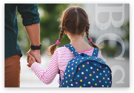 little girl holding dad's hand